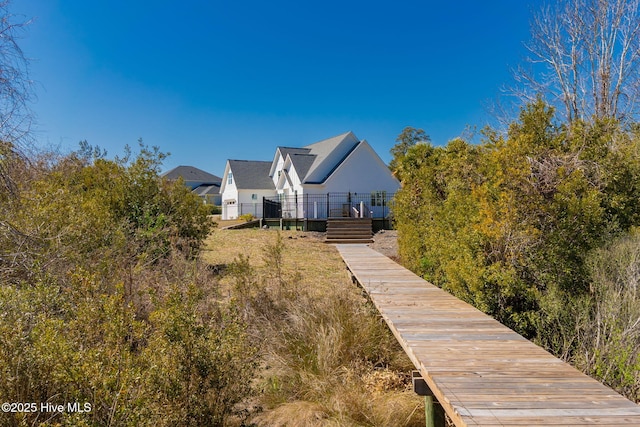 rear view of property with a deck