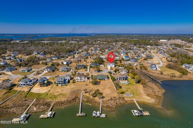 aerial view featuring a water view and a residential view