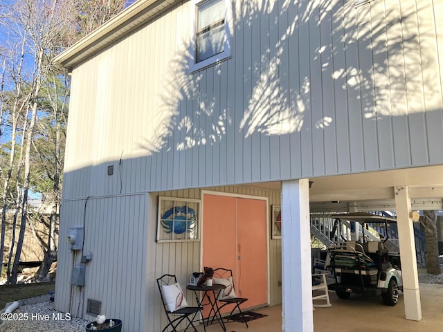 exterior space featuring a carport