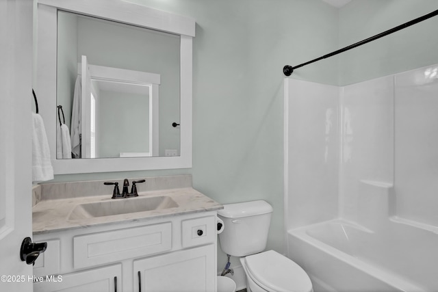 full bath with toilet, vanity, and  shower combination