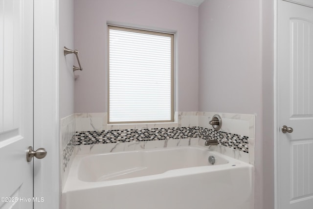 bathroom featuring a garden tub