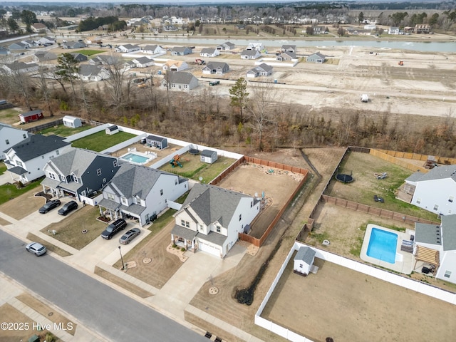 aerial view with a residential view and a water view