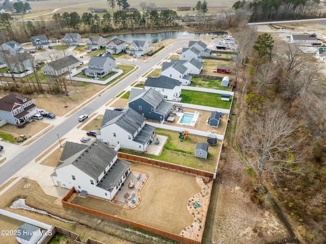 aerial view featuring a residential view and a water view