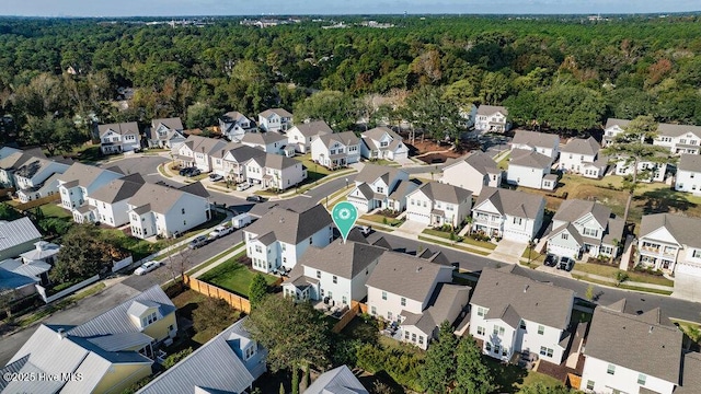 aerial view with a residential view and a forest view