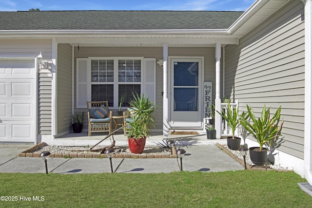 doorway to property with a porch, a garage, and roof with shingles