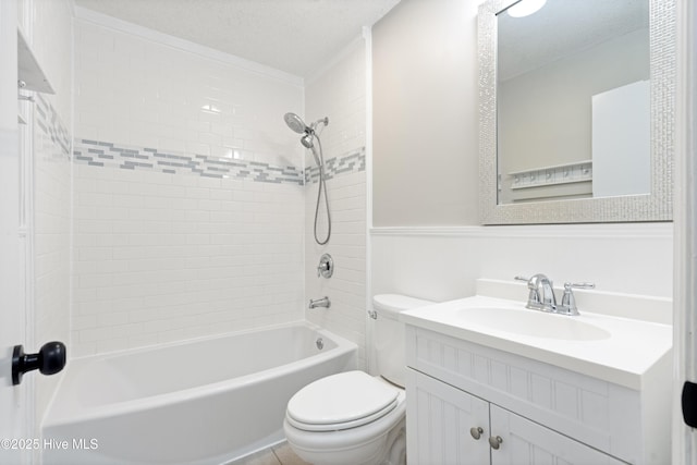 bathroom with vanity, toilet, bathing tub / shower combination, and a textured ceiling