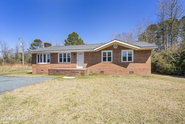 single story home with crawl space, a chimney, a front lawn, and brick siding