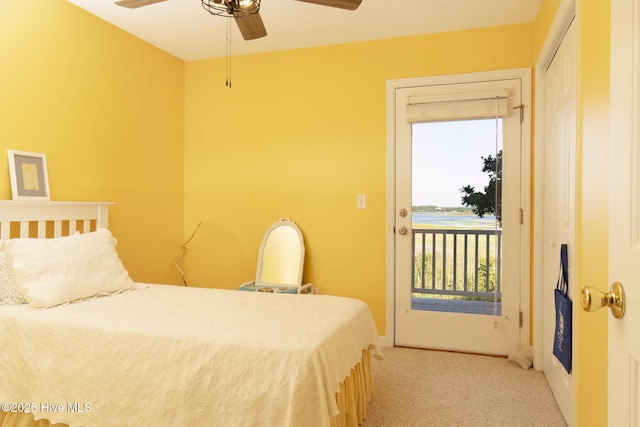 bedroom with access to outside, light colored carpet, baseboards, and ceiling fan