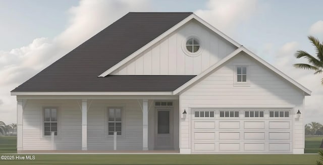 view of front facade with a garage, covered porch, and board and batten siding