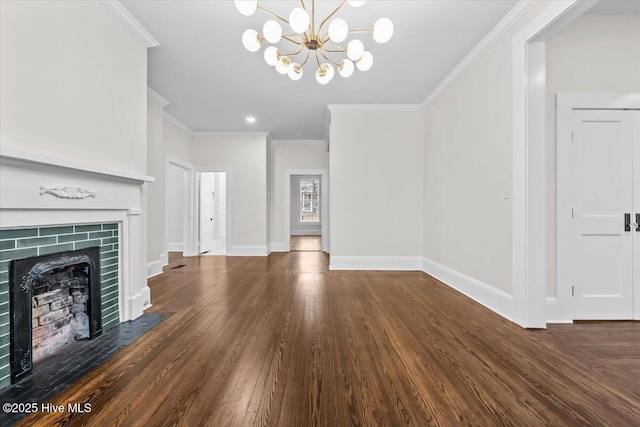 unfurnished living room with baseboards, wood finished floors, a tiled fireplace, and ornamental molding