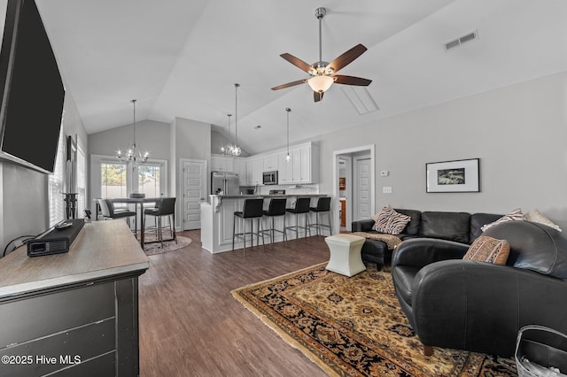 living room featuring visible vents, high vaulted ceiling, dark wood-style floors, and ceiling fan with notable chandelier