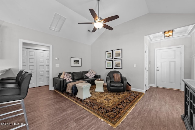 living area with a ceiling fan, wood finished floors, baseboards, and high vaulted ceiling