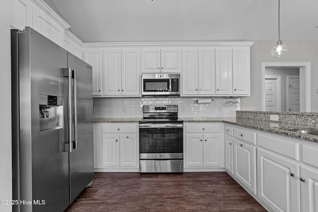 kitchen featuring stainless steel appliances, dark wood-style floors, white cabinets, and decorative backsplash