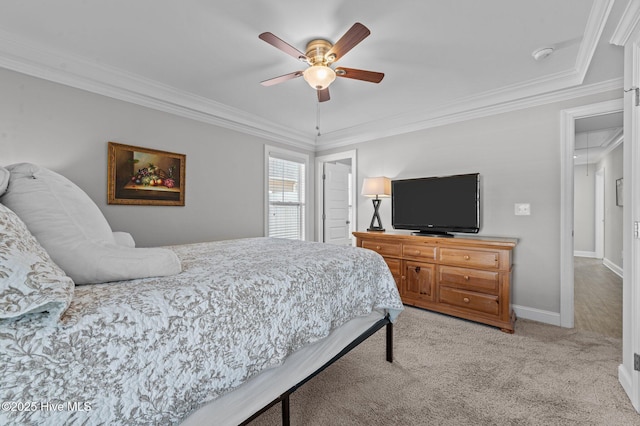 bedroom featuring light carpet, ornamental molding, baseboards, attic access, and ceiling fan