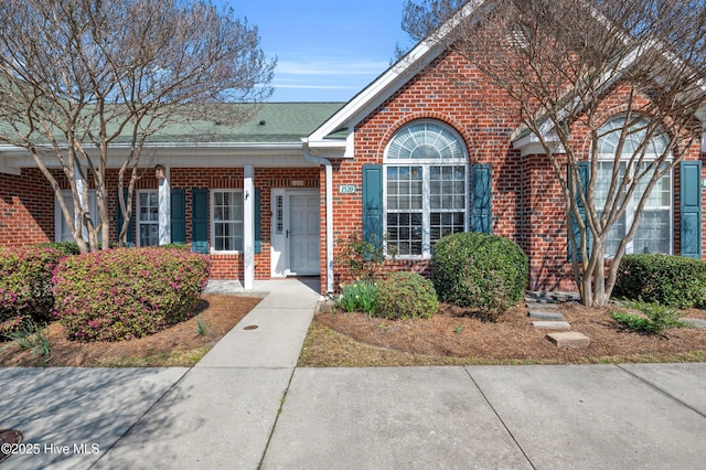 view of front of home featuring brick siding