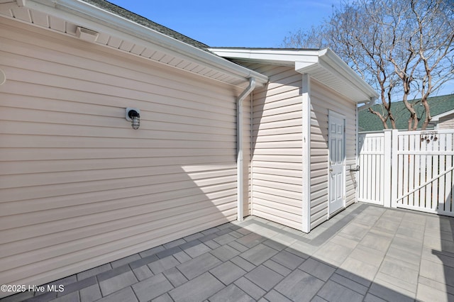 exterior space with a gate and fence