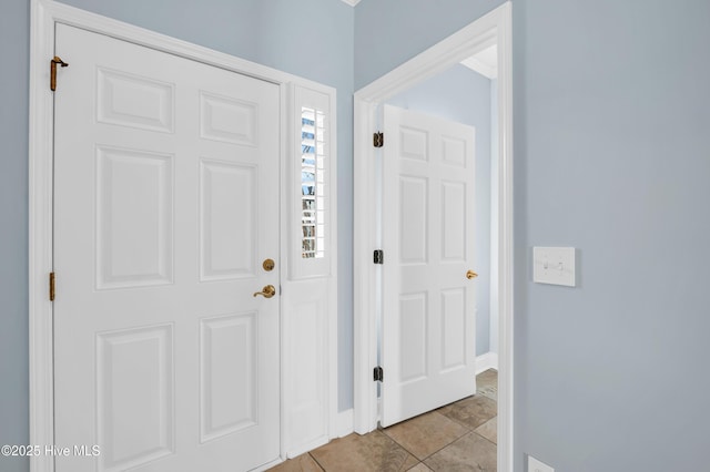 entrance foyer featuring baseboards