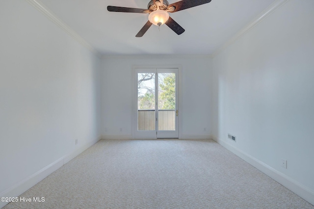 unfurnished room with baseboards, light carpet, ceiling fan, and crown molding