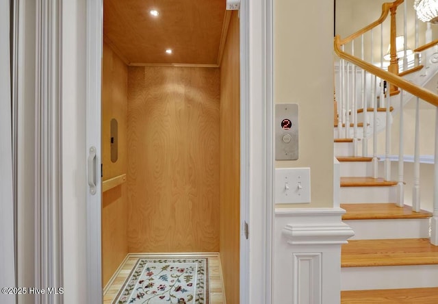 interior space with elevator and recessed lighting