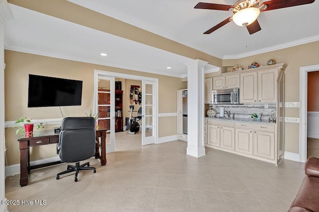 interior space featuring french doors, ornamental molding, ornate columns, recessed lighting, and light tile patterned floors