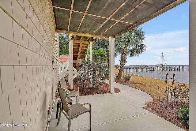 view of patio / terrace featuring a water view