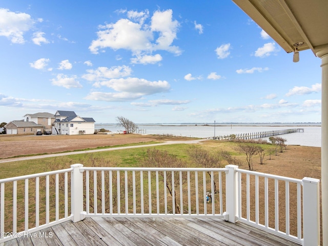 wooden terrace with a water view