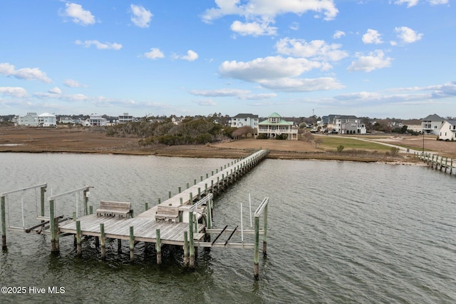 view of dock with a water view