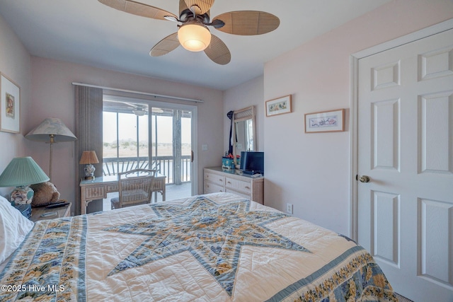 bedroom with a ceiling fan and access to outside