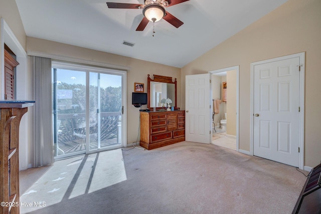 unfurnished bedroom with visible vents, access to outside, connected bathroom, carpet flooring, and lofted ceiling