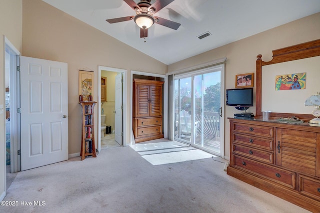 carpeted bedroom with visible vents, ceiling fan, lofted ceiling, ensuite bath, and access to outside