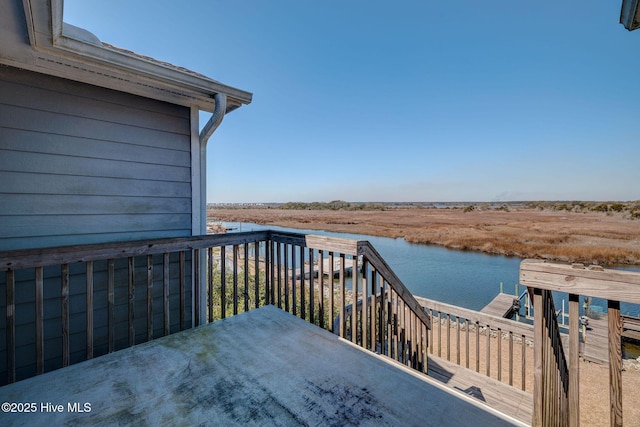 deck featuring a water view