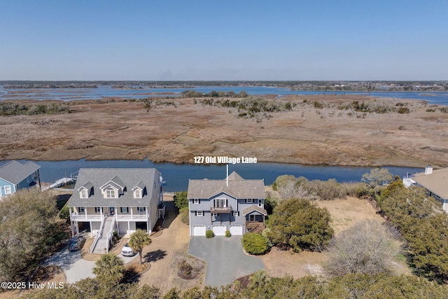 aerial view featuring a water view