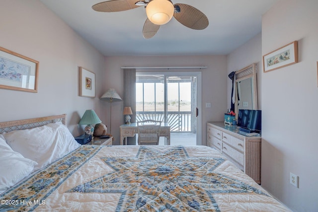 bedroom featuring access to exterior and a ceiling fan