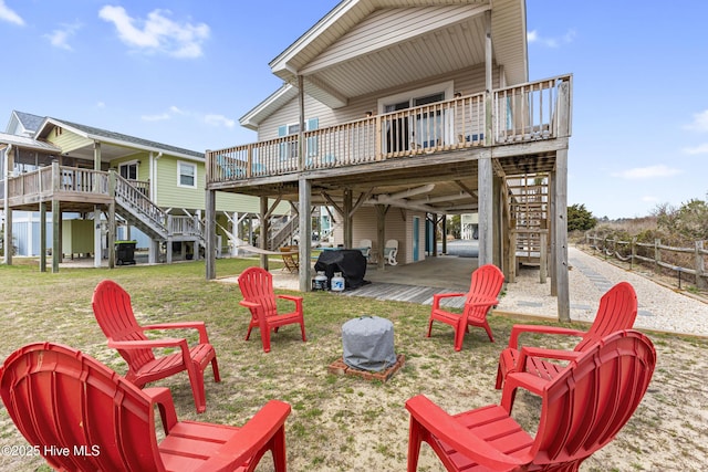 view of patio / terrace featuring stairs, area for grilling, and a deck