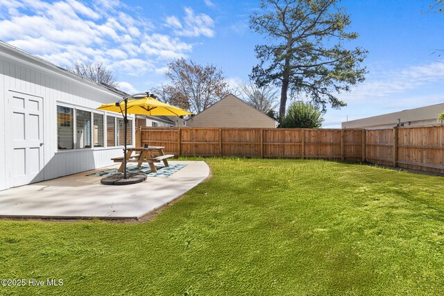 view of yard featuring a fenced backyard and a patio area