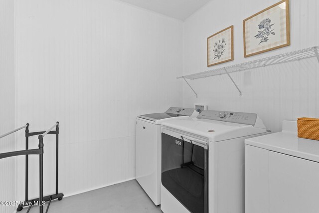 laundry area featuring independent washer and dryer and laundry area