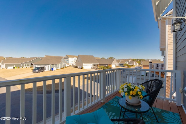 balcony featuring a residential view