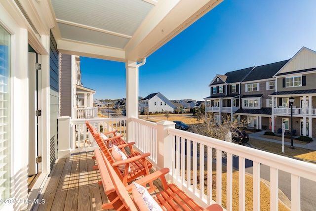 balcony featuring a residential view