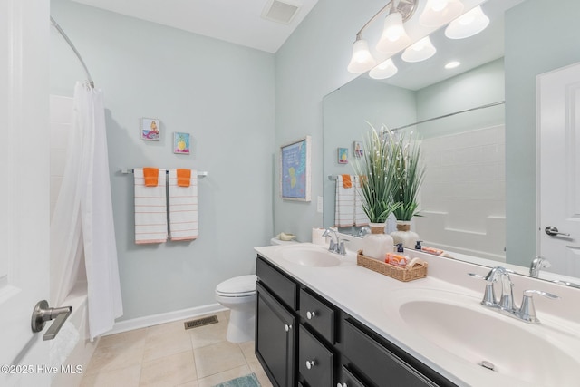 full bath featuring tile patterned flooring, visible vents, and a sink