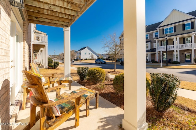 view of patio with a residential view