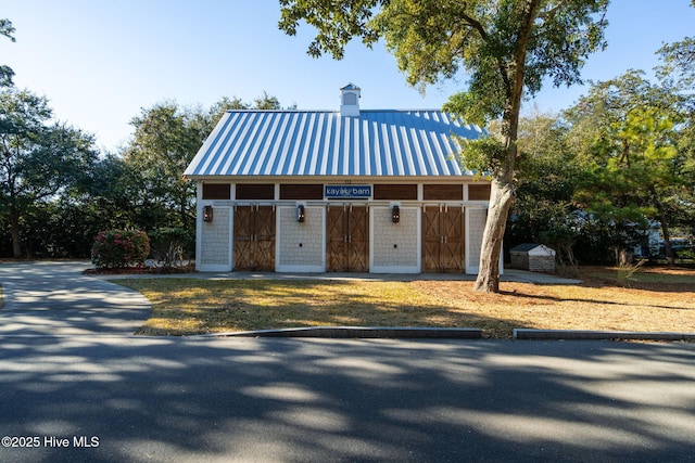 view of front facade with an outdoor structure