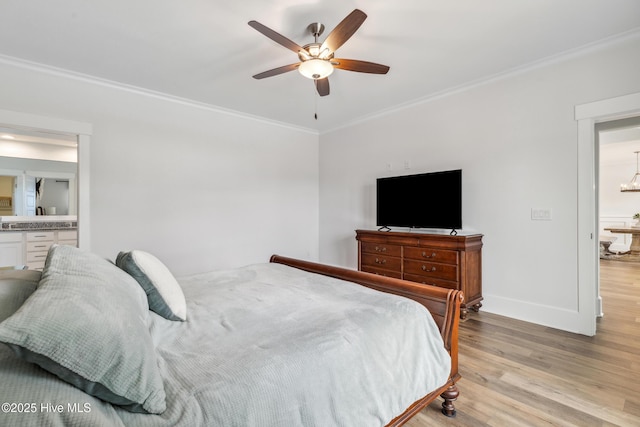 bedroom with a ceiling fan, light wood finished floors, baseboards, and ornamental molding