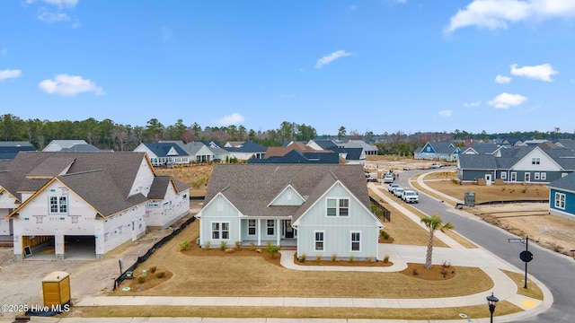 drone / aerial view featuring a residential view