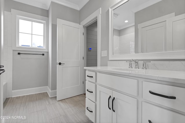 full bathroom with recessed lighting, baseboards, and vanity