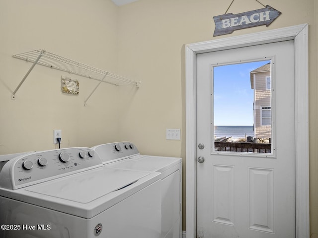 laundry area featuring washer and dryer and laundry area