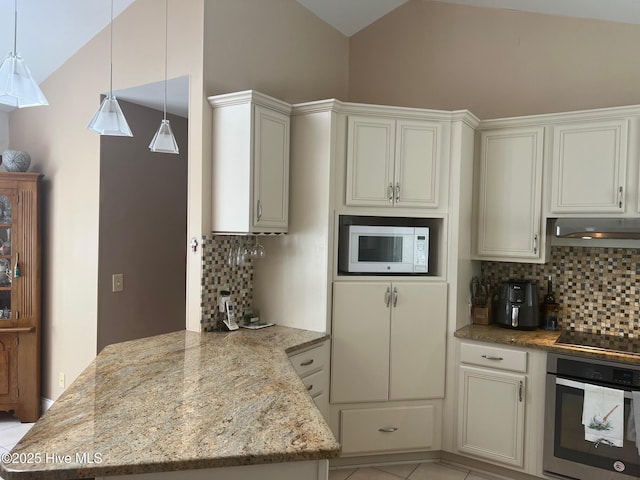 kitchen featuring oven, a peninsula, decorative backsplash, black electric stovetop, and white microwave