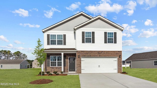 view of front of property with a front yard, brick siding, an attached garage, and driveway