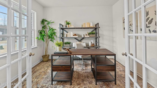 home office featuring french doors and baseboards