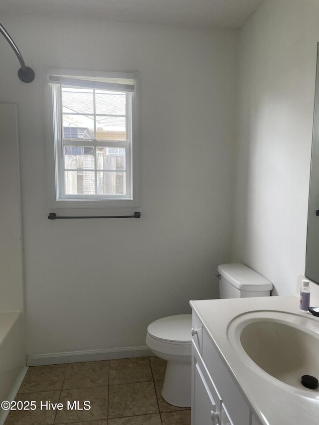 7223 Konlack Ct, Wilmington, NC 28411 - bathroom with vanity, tile patterned flooring, toilet, walk in shower, and baseboards
