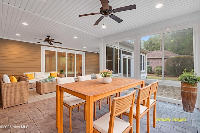1115 Eldora Ct, Leland, NC 28451 - sunroom with ceiling fan, outdoor lounge area, and outdoor dining space